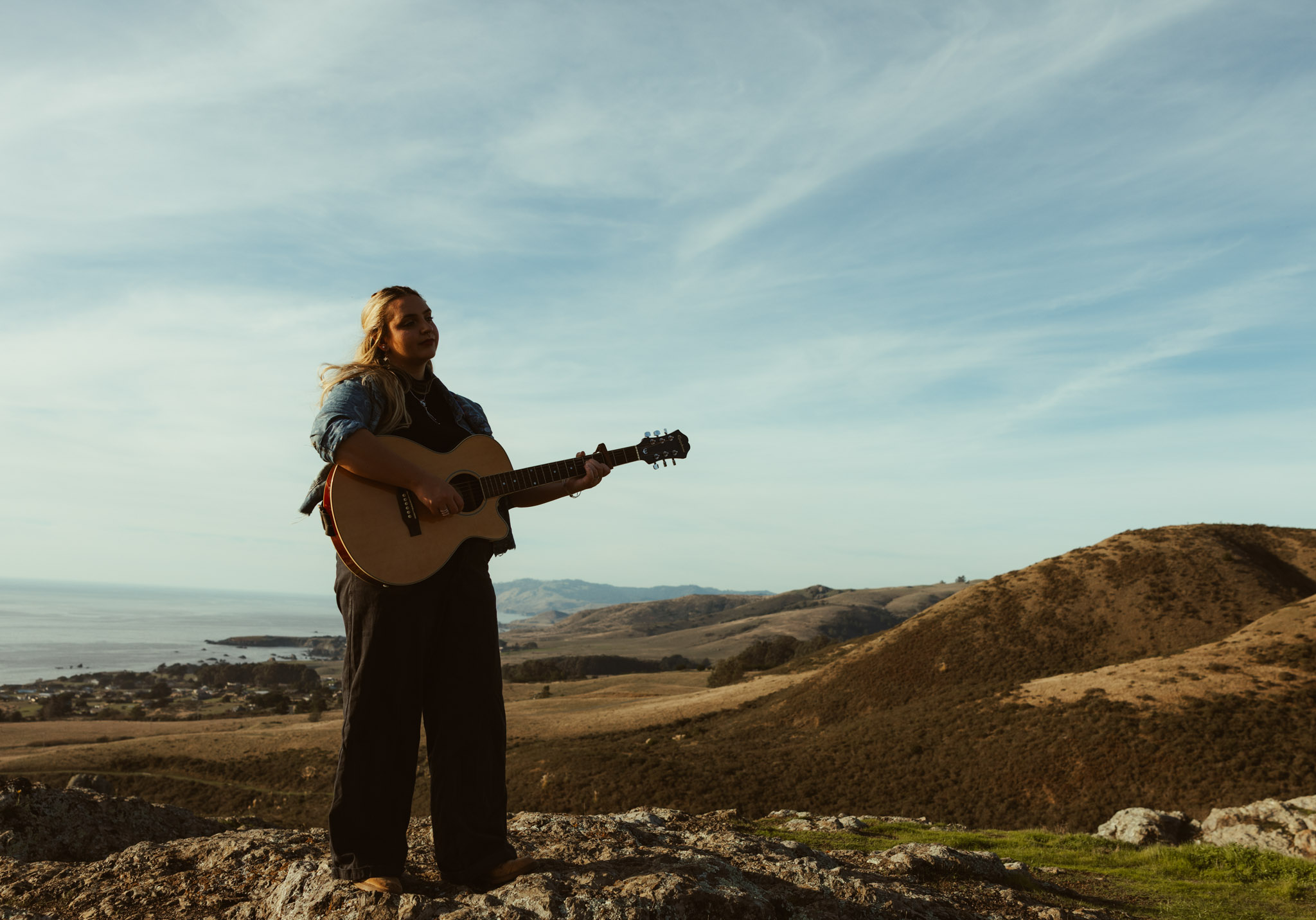 Sunny Mitchell with guitar